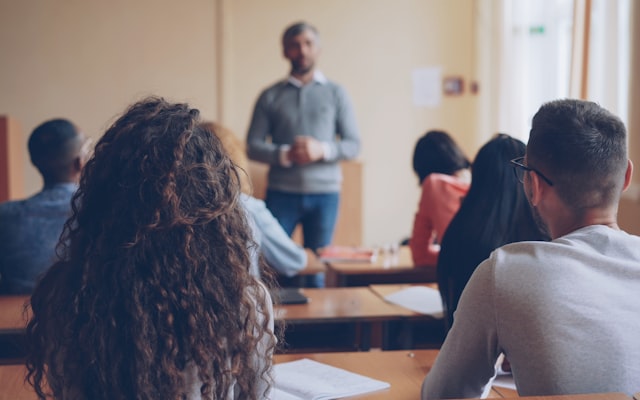 Teacher instructing students in a classroom