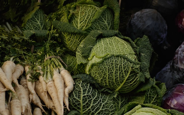 Cabbage and vegetables at a market stall