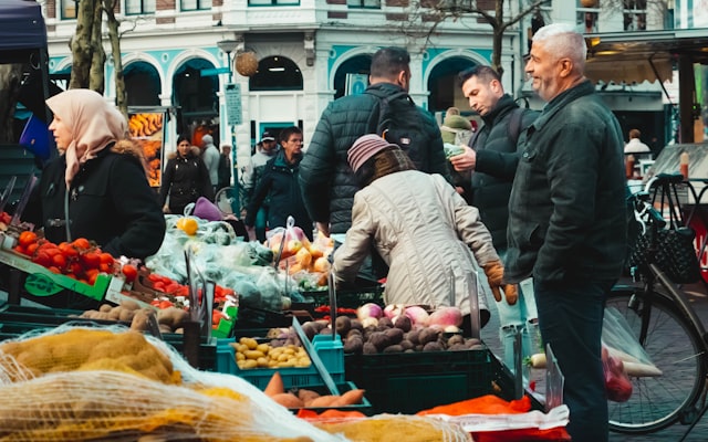 People shopping at a farmers market
