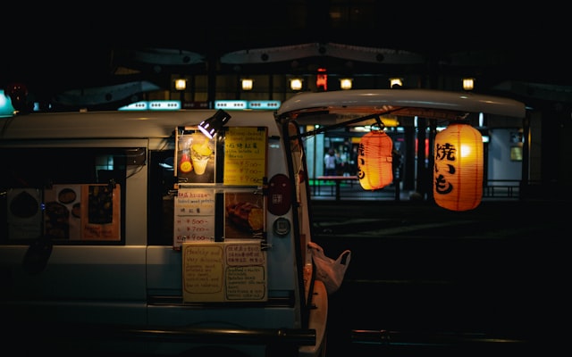 Food truck at night with lanterns