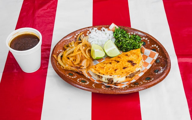 Photo by Sangria Señorial on Unsplash — representative image for Taqueria La Plebe