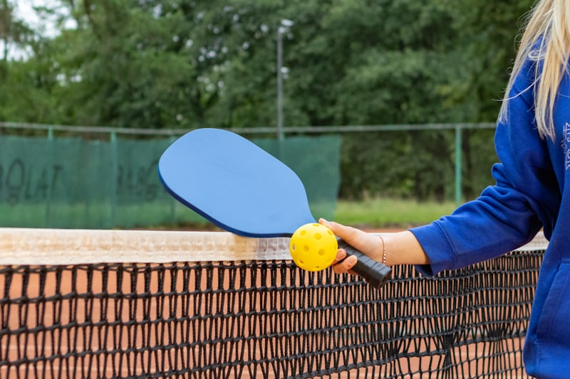 Photo by Alex Saks on Unsplash — representative image for Pickleball Paddock