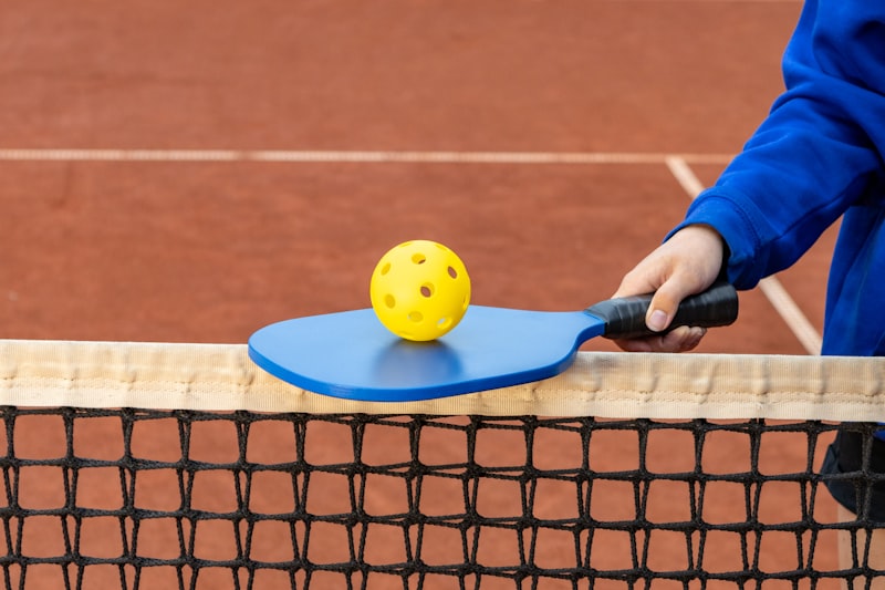 Photo by Alex Saks on Unsplash — representative image for The Biggest Dill: Pickleball Tournament