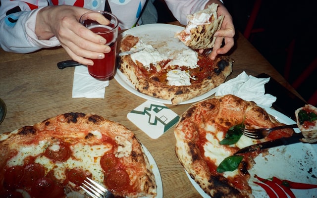 Photo by Oksana Demenko on Unsplash — representative image for Domino's Pizza (Domino's)