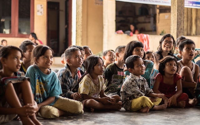 Group of children sitting on ground