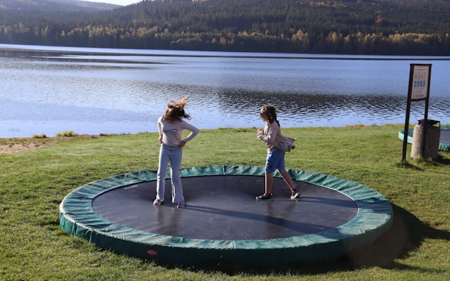 Children playing on trampoline