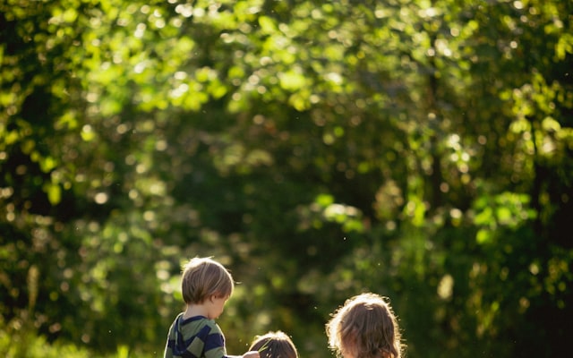 Kids at a picnic table outdoors