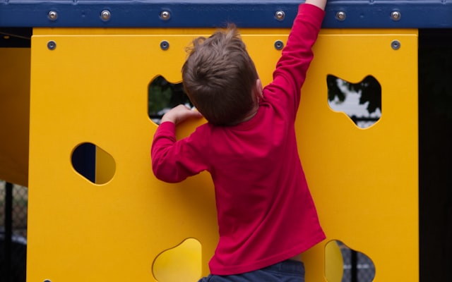Child climbing on a playground